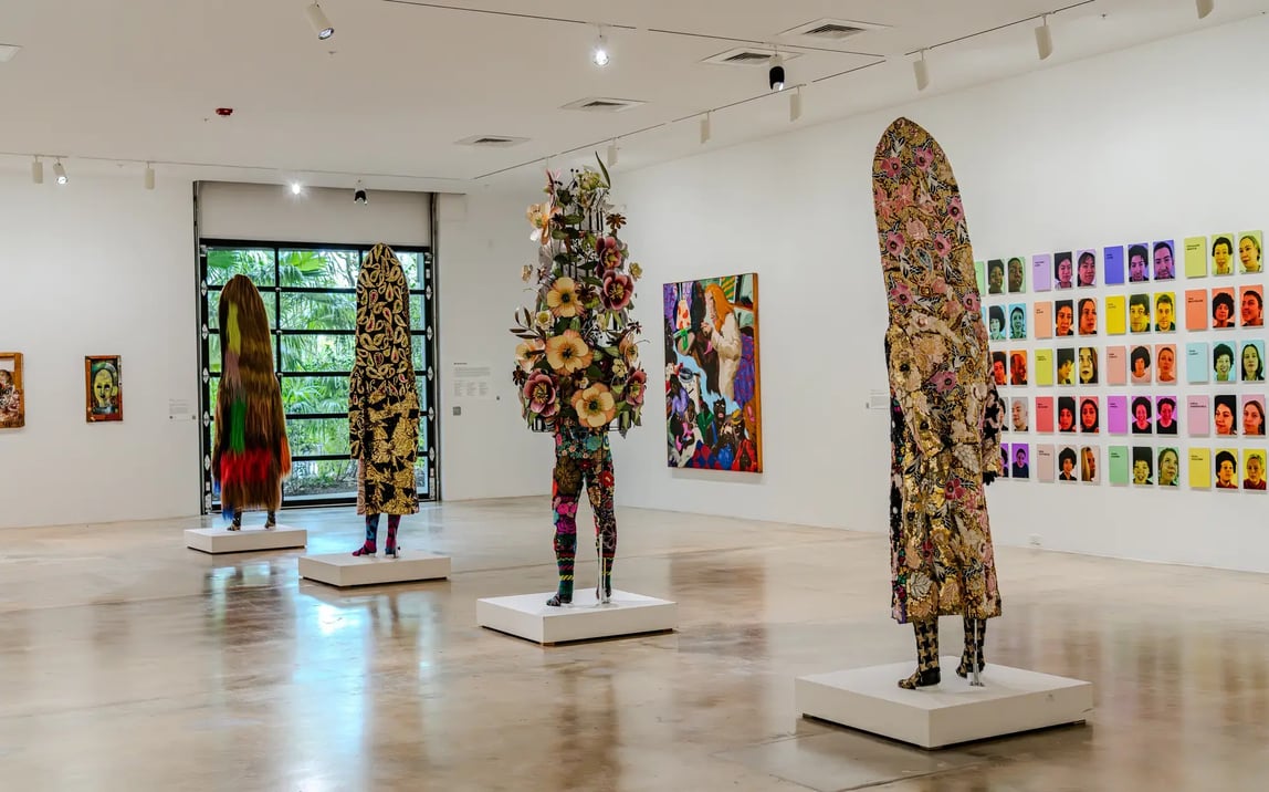 Contemporary art exhibition with colorful sculptures